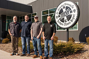 SIU fermentation science student with St. Nicholas Brewmaster and program director