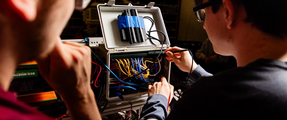 Students working on a board