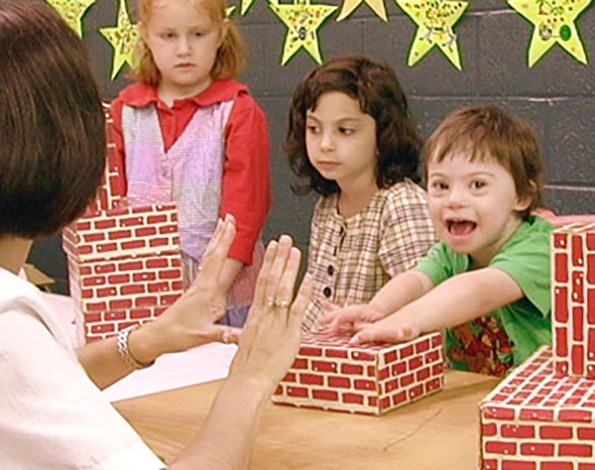 SIU Student working with Students