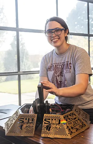 SIU Robotics Student with their latest design