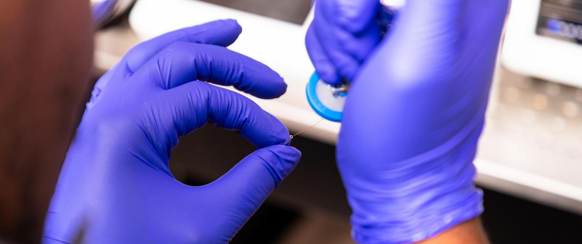 SIU Student taking samples in Biomedical Engineering Lab