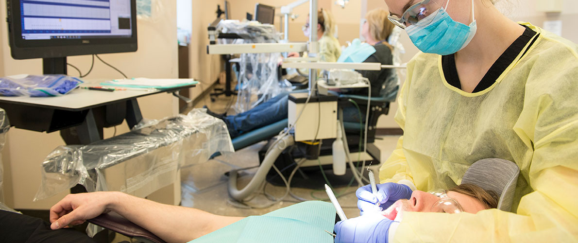 SIU Dental Hygiene Student works in the Dental Hygiene Clinic