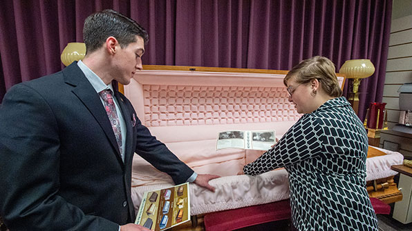 SIU Mortuary Science and Funeral Service Students practice explaining the benefits of caskets