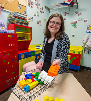 SIU Student works with blocks in Psychology Lab