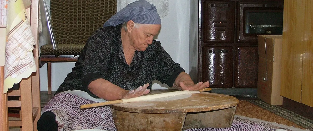 SIU Anthropology woman making fillo dough