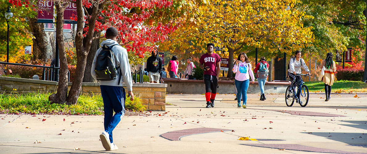 Student walking on SIU Campus 