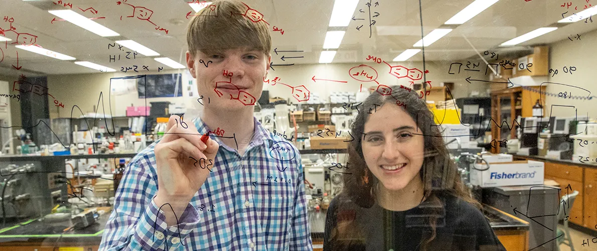 SIU Chemistry Students work in lab