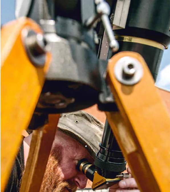 SIU Physics looking through Telescope